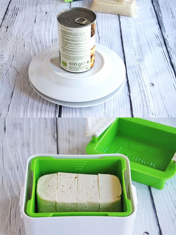 pressing tofu using a green tofu press or between 2 plates with an unopened can on top
