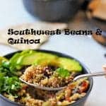 black bowl of Southwest beans & quinoa with avocado slices, lime slices and chopped cilantro with spoonful being held up. Black text with recipe title on picture.