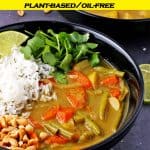 veggie massaman curry with rice, chopped peanuts and cilantro in black bowl with text overlay and recipe title