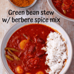 Stew with green beans, potatoes, kidney and tomato sauce with berbere spice mix in bowl with recipe title.