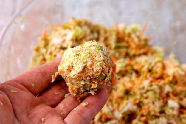 A ball made from a dough of grated carrot, cabbage, Brussels sprouts, and onion with whole wheat flour, corn starch, and salt.