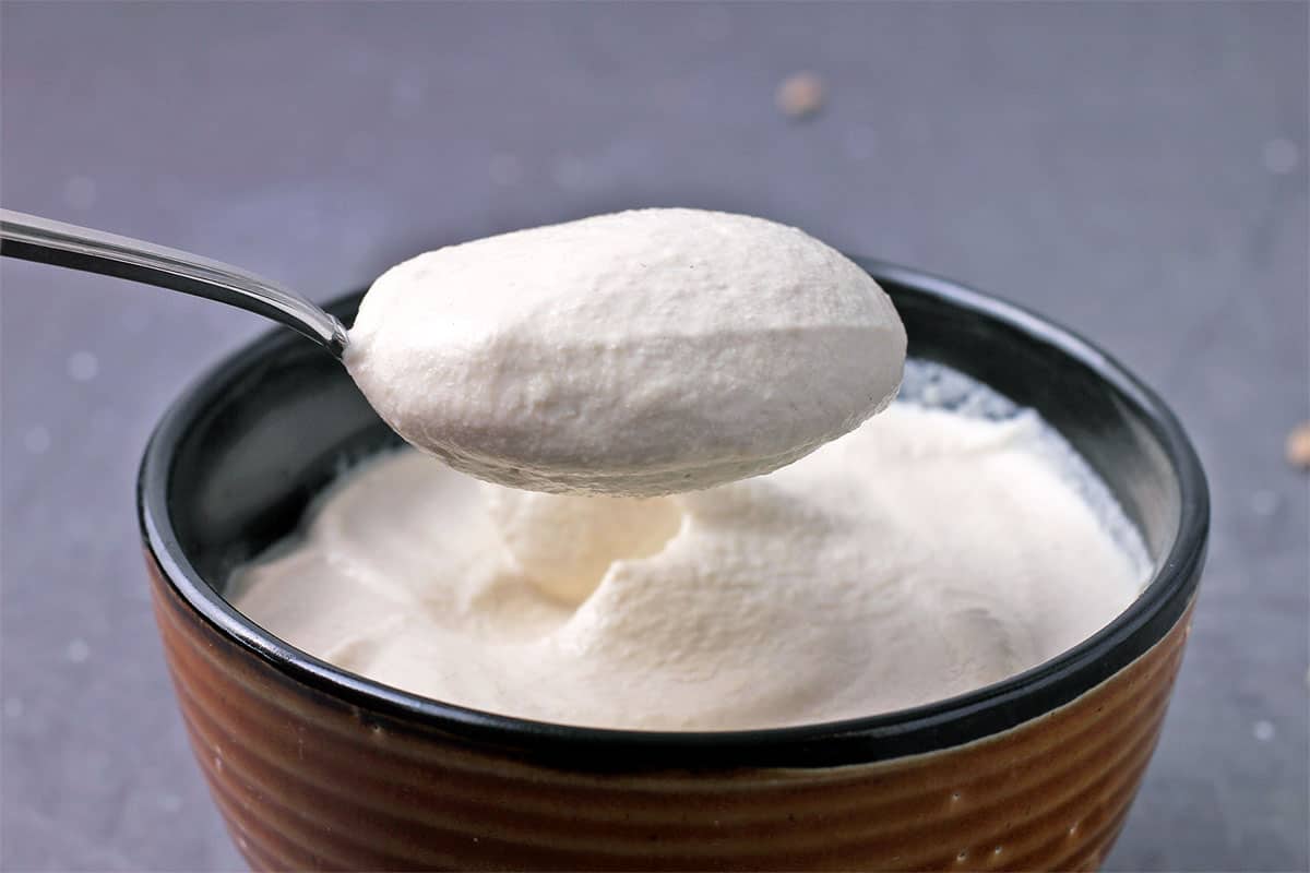A spoonful of sunflower seed sour cream.