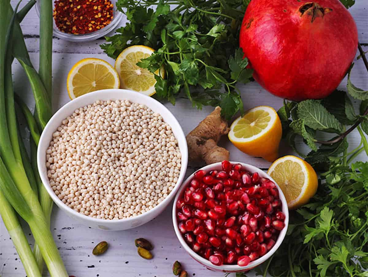 The ingredients for pomegranate and couscous salad.
