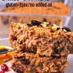 A slice of vegan baked oatmeal with walnuts and cranberries with pomegranate and orange slices and text overlay with recipe title.