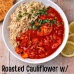 Cauliflower with vindaloo sauce and basmati rice in a white bowl with text overlay of the recipe title on the picture.