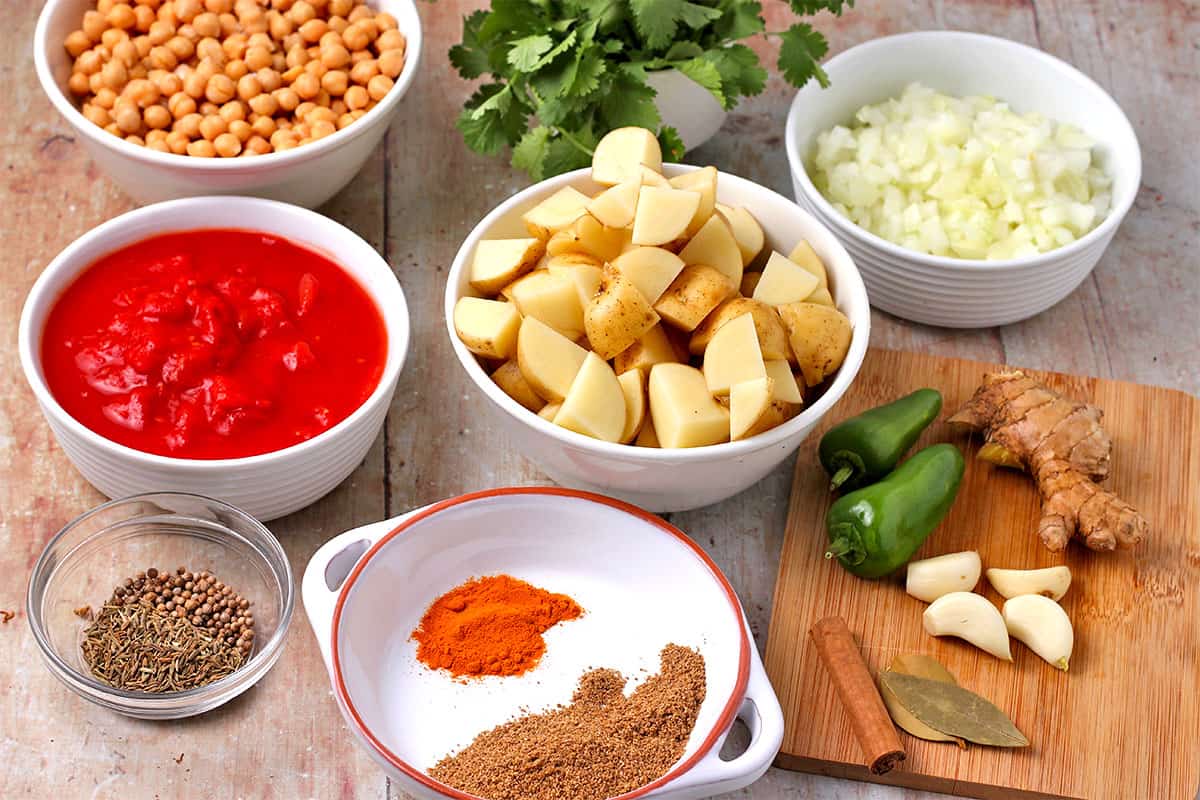 The ingredients for chickpea and potato curry are laid out.
